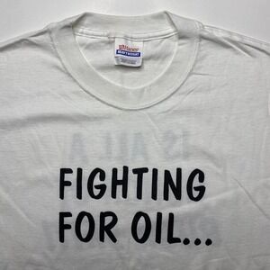 Vintage George Bush Fighting for oil military war shirt